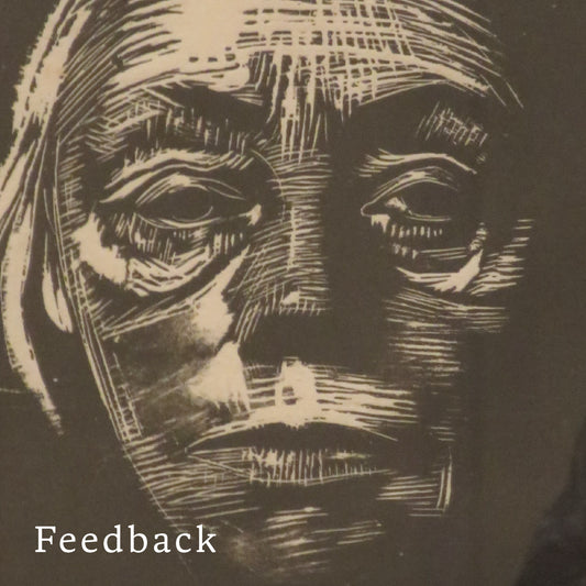 Close up of a woman's face carved in wood
